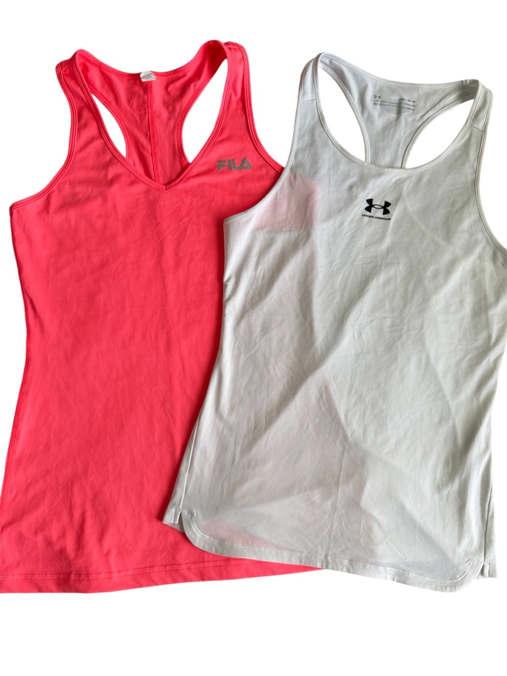 Under Armour white HeatGear Armour and Fila bright pink athletic Racer Tank Tops